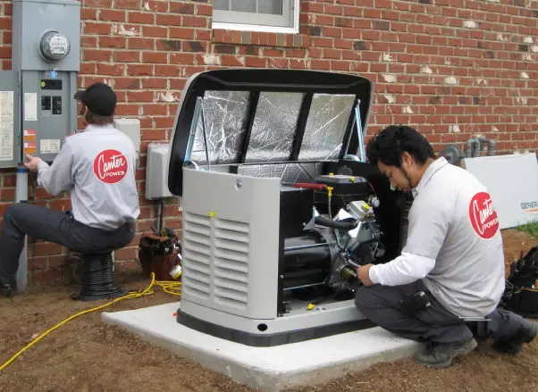 Technicians servicing a home generator, inspecting internal components and electrical connections, with a control panel visible nearby, emphasizing maintenance and reliability for backup power systems.