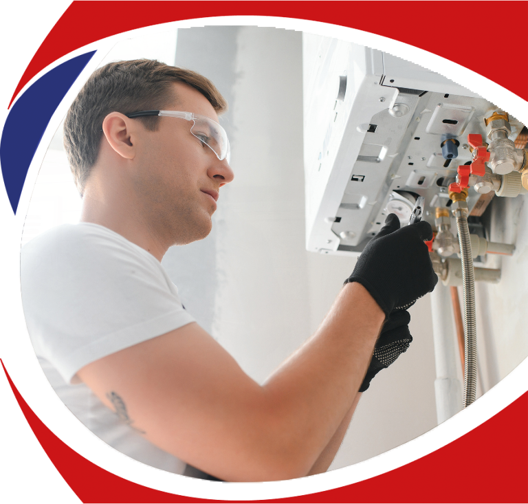 Technician performing heating installation service in residential setting, focused on equipment, wearing safety glasses and gloves, emphasizing professional heating solutions in Troy, MI.