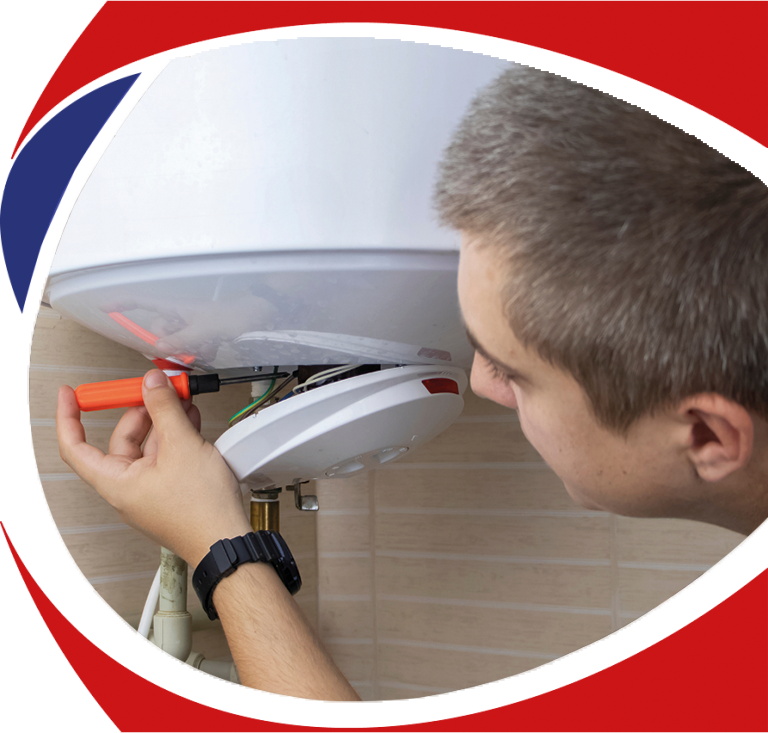 Technician performing water heater installation service, adjusting components with a screwdriver, highlighting professional plumbing expertise in Troy and Oakland County.