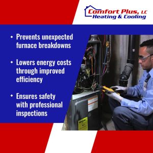 A technician in safety glasses and gloves inspecting an open furnace unit.